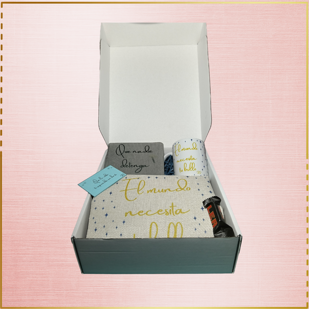 Pack con taza, bolsa tote, cuaderno y bolígrafo.