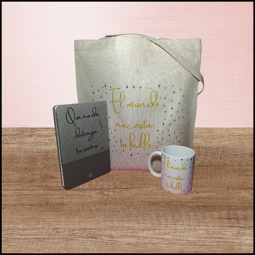 Pack con taza, bolsa tote, cuaderno y bolígrafo.